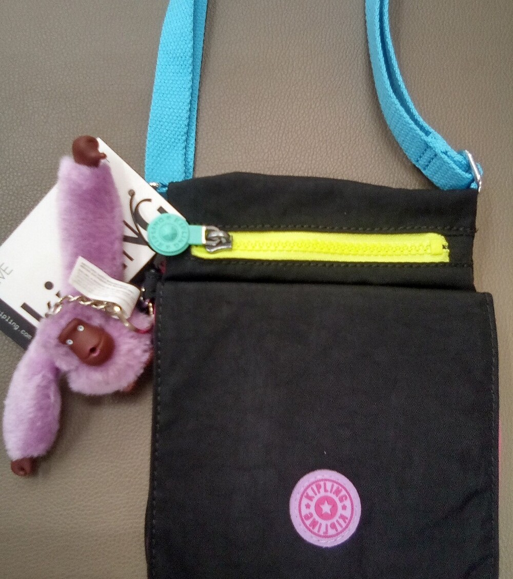 Kipling's Finger Sucking Gorilla Crossbody Bag.